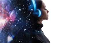 A woman with headphones, facing left, surrounded by abstract celestial imagery