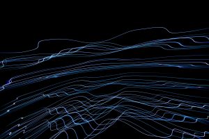 Abstract lines in blue and white on a black background, resembling waves or light trails